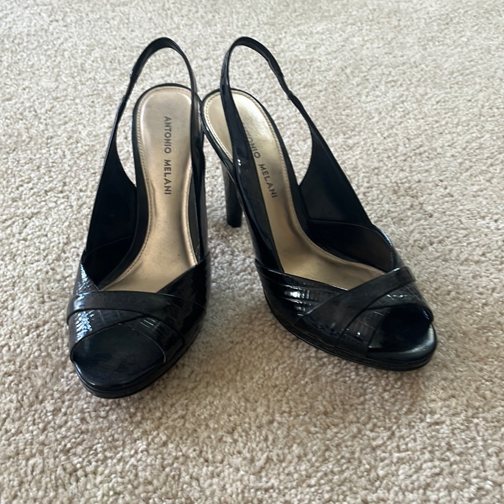 Black open toed heels. Worn 3 times excellent condition.